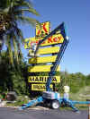 KOA Sign T in Cherry Picker.jpg (65796 bytes)